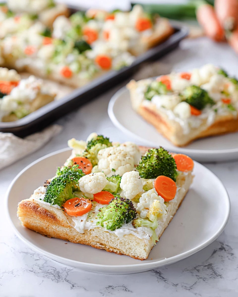The image shows two square slices of vegetable pizza on a white plate. The bottom layer is a thick golden-brown bread crust. On top of the crust is a creamy white sauce spread evenly. The top layer has fresh vegetable pieces including green broccoli florets, white cauliflower, and round orange carrot slices scattered generously. In the background, more vegetable pizza slices on a white plate and a baking tray with similar pizza can be seen, all set on a white marbled surface. photo taken with an iphone --ar 4:5 --v 7